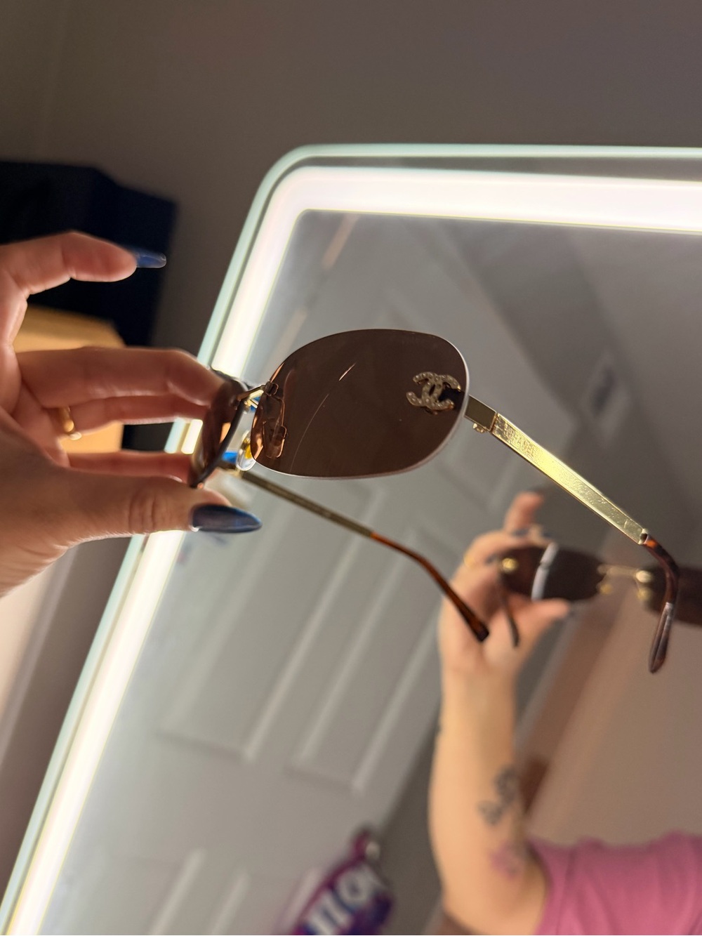 CHANEL Gold Rimless Sunglasses with Brown Lenses